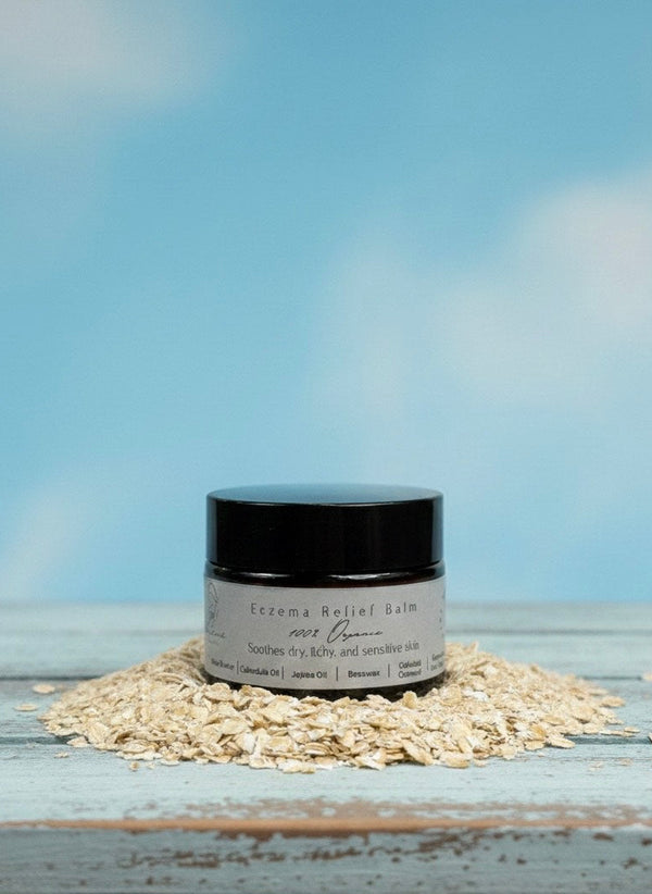 Jar of cream on a wooden surface with a blue sky background